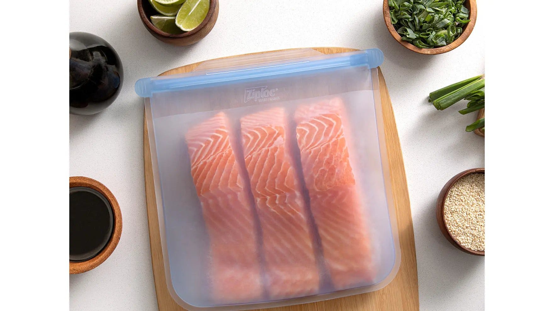 Salmon filets in Ziploc Endurables pouch on cutting board